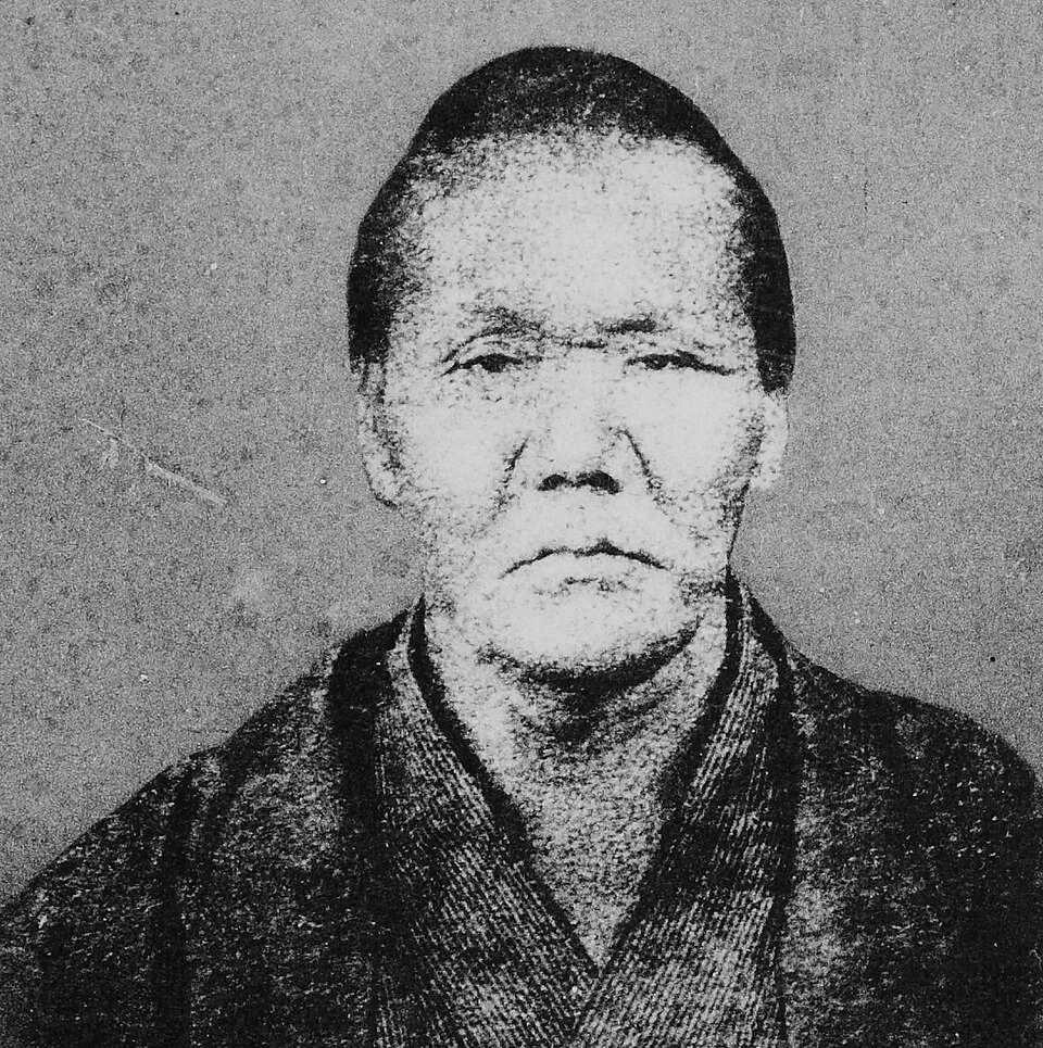 Historical black-and-white portrait of yakuza figure Shimizu no Jirocho, circa 1879; illustrative, not the TEL tour guide.